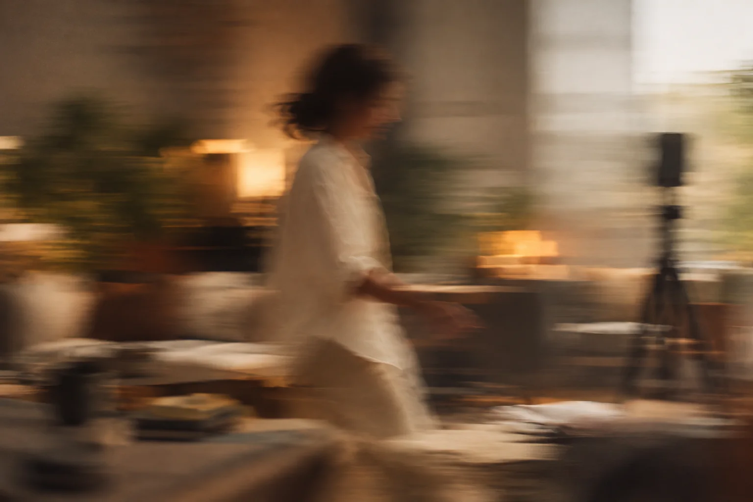 Fabric moving through a softly lit scene